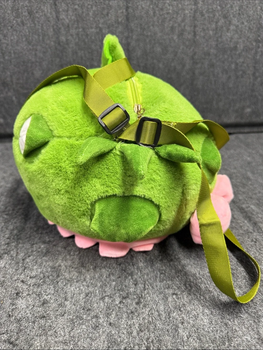 Sanrio Hello Kitty Plush in Green Dino Outfit with Pink Trim